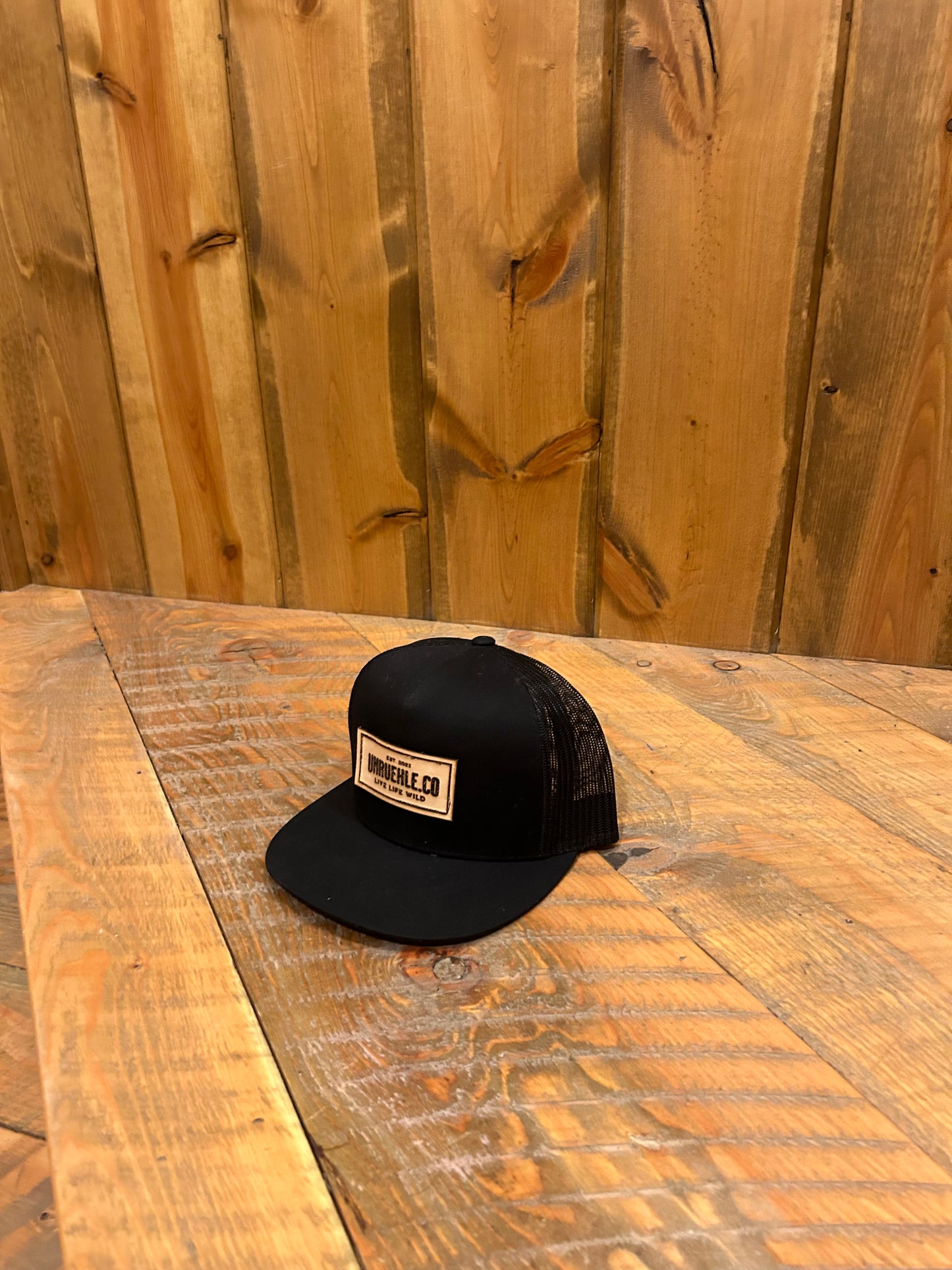 Black UNRUEHLE.Co Hat