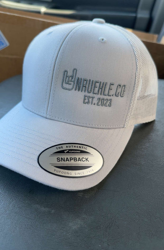 Silver UNRUEHLE.Co Trucker Hat